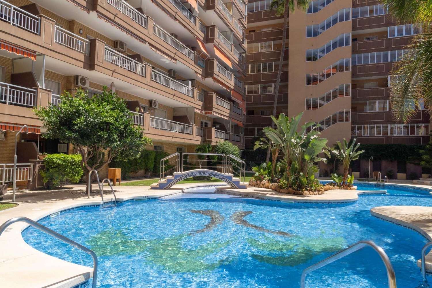 Fantastic flat located 1st line of beach, with views pool and garage